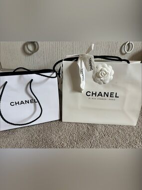 CHANEL White Shopping Bag with Black Logo, Ribbon and Camellia